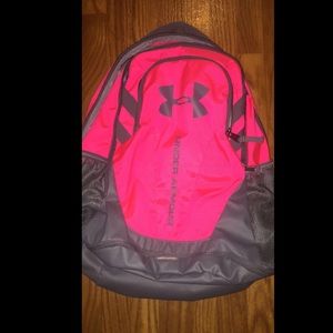 Pink under armour back pack.